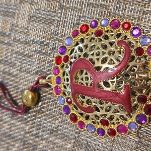 Liz Claiborne Gold Brooch with Red and Purple Accents. Letter R
